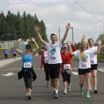 Teach One to Lead One 5K finishers